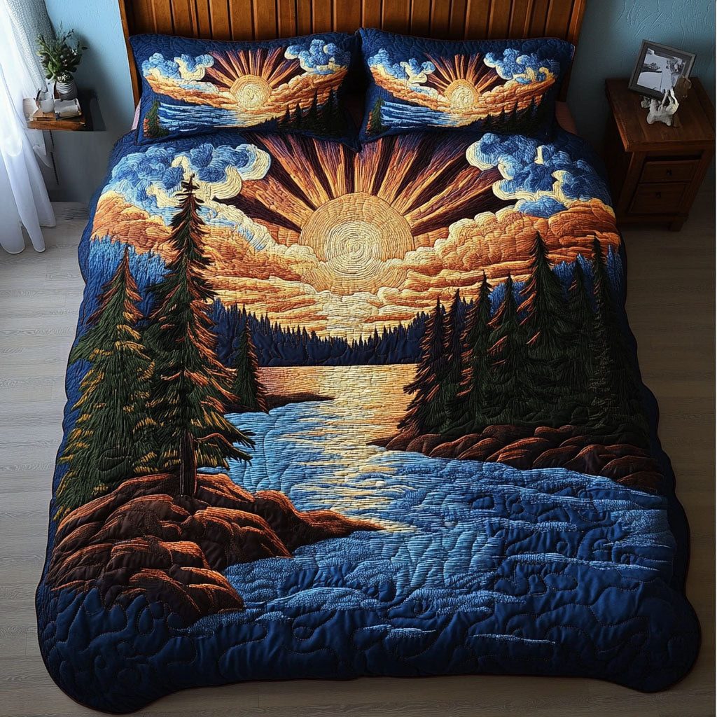 Sunset Serenity quilted 3-piece bedding set on a made bed with two matching pillow shams