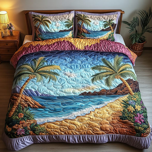 Sunset Shores quilted 3-piece bedding set on a made bed in a light coastal bedroom