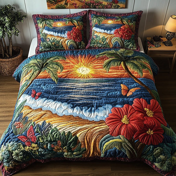 Sunset Shores quilted 3-piece bedding set on a made bed in a light coastal bedroom