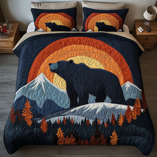 Sunset Silhouette Bear quilted 3-piece bedding set on a made bed with two matching pillow shams