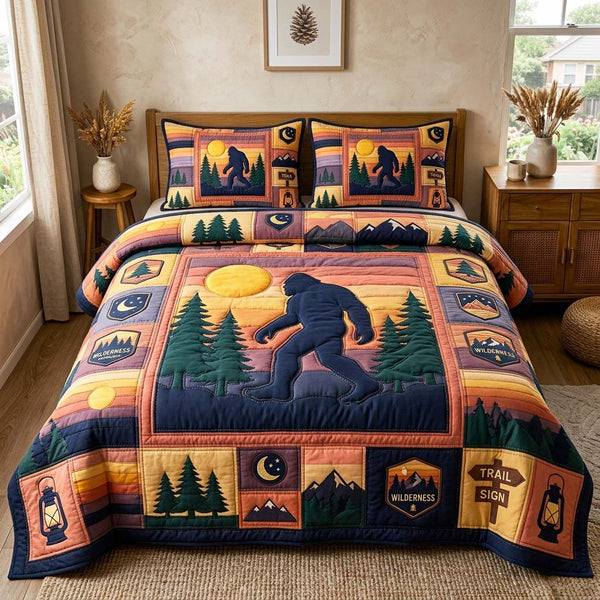 Sunset Silhouette quilted 3-piece bedding set on a made bed with two matching pillow shams