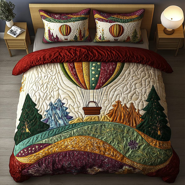 Sunset Soar quilted 3-piece bedding set on a made bed with two matching pillow shams