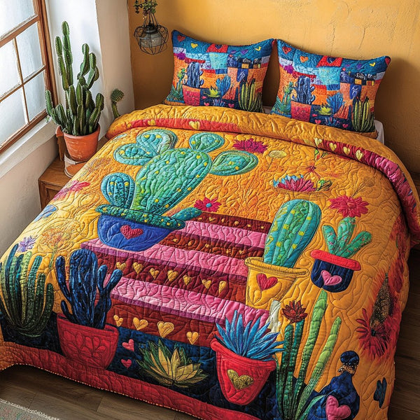 Sunset Steps quilted 3-piece bedding set on a made bed with two matching pillow shams