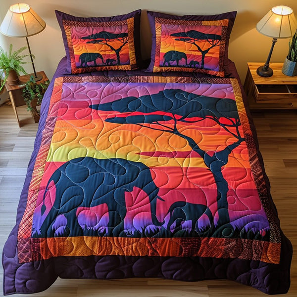 Sunset Stroll quilted 3-piece bedding set on a made bed with two matching pillow shams