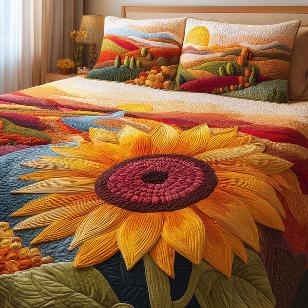 Sunset Sunflower quilted 3-piece bedding set on a made bed with two matching pillow shams