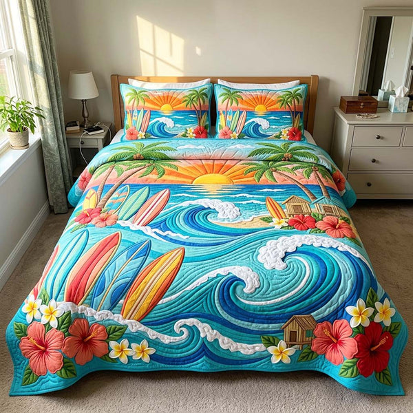 Sunset Surf quilted 3-piece bedding set on a made bed in a light coastal bedroom