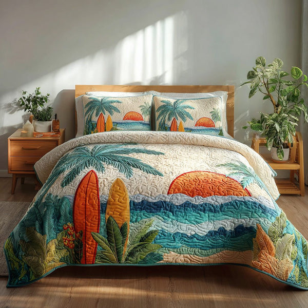 Sunset Surf quilted 3-piece bedding set on a made bed in a light coastal bedroom