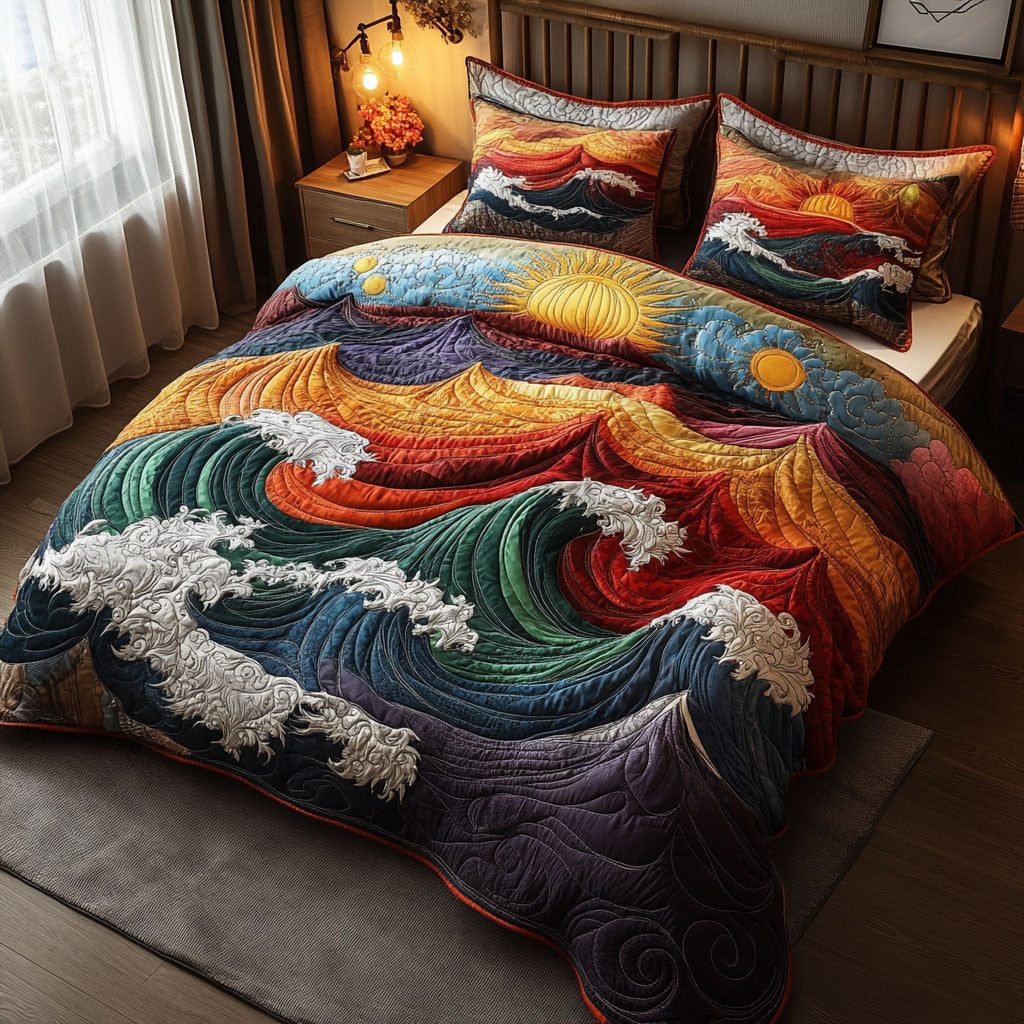 Sunset Swells quilted 3-piece bedding set on a made bed with two matching pillow shams