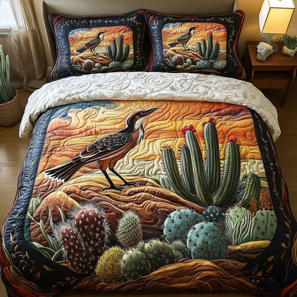 Sunset Tracker quilted 3-piece bedding set on a made bed with two matching pillow shams