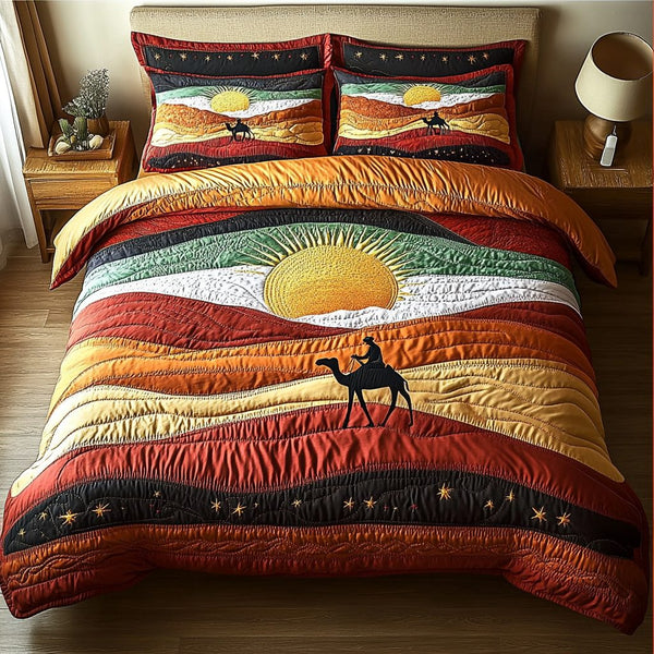 Sunset Trail quilted 3-piece bedding set on a made bed with two matching pillow shams