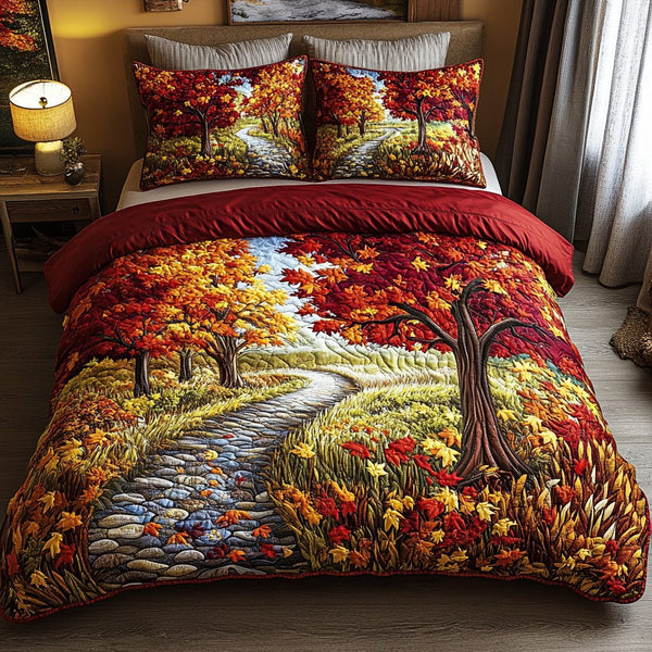 Sunset Trail quilted 3-piece bedding set on a made bed with two matching pillow shams