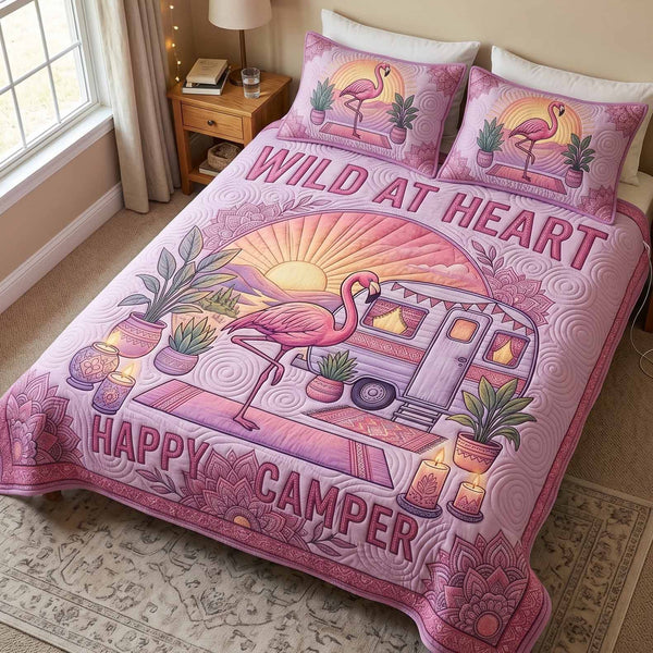 Sunset Trailer quilted 3-piece bedding set on a made bed with two matching pillow shams