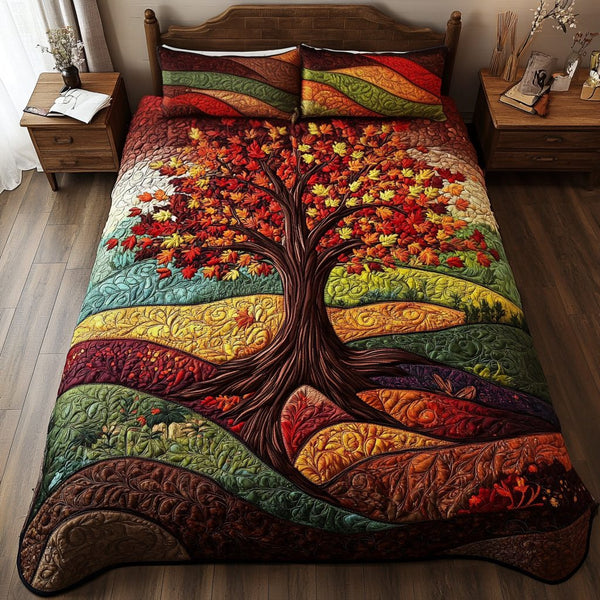 Sunset Tree quilted 3-piece bedding set on a made bed with two matching pillow shams