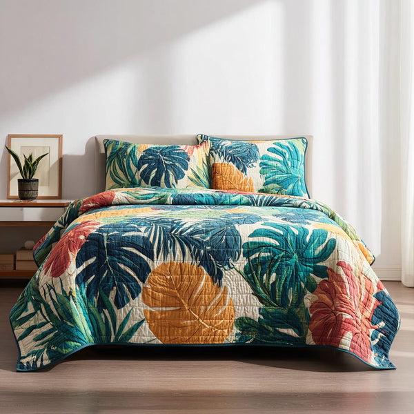 Sunset Tropics quilted 3-piece bedding set on a made bed with two matching pillow shams