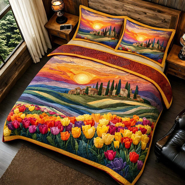 Sunset Tulips quilted 3-piece bedding set on a made bed with two matching pillow shams