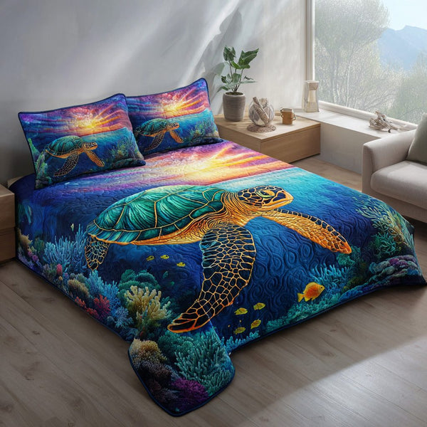 Sunset Voyager quilted 3-piece bedding set on a made bed with two matching pillow shams