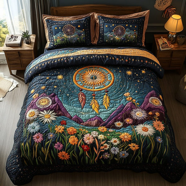 Sunset Whispers quilted 3-piece bedding set on a made bed with two matching pillow shams