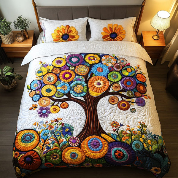 Sunshine Bloom quilted 3-piece bedding set on a made bed with two matching pillow shams