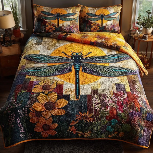 Sunshine Dragonfly quilted 3-piece bedding set on a made bed with two matching pillow shams