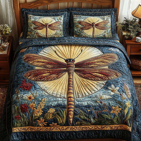 Sunshine Dragonfly quilted 3-piece bedding set on a made bed with two matching pillow shams