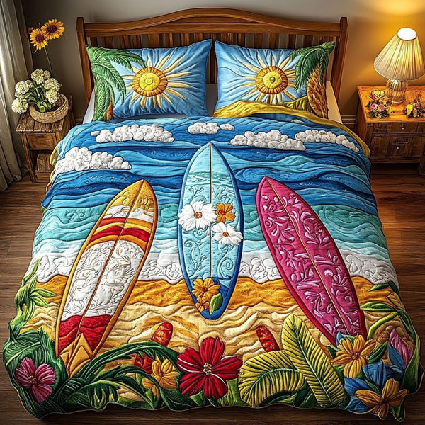 Surf Retreat quilted 3-piece bedding set on a made bed in a light coastal bedroom