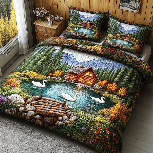 Swan Lake Escape quilted 3-piece bedding set on a made bed with two matching pillow shams