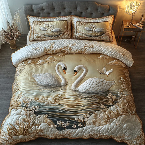 Swan Lakeview quilted 3-piece bedding set on a made bed with two matching pillow shams