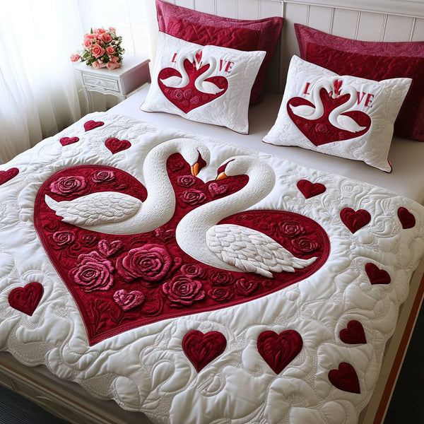 Swan Song of Love quilted 3-piece bedding set on a made bed with two matching pillow shams