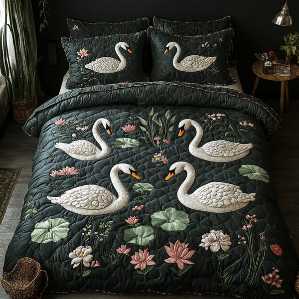 Swan Whisper quilted 3-piece bedding set on a made bed with two matching pillow shams