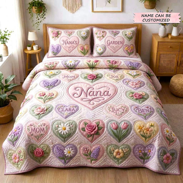 Sweet Bloom 3-Piece Quilted Bedding Set QTCUZ - Design 1 quilted 3-piece bedding set on a made bed with two matching pillow shams