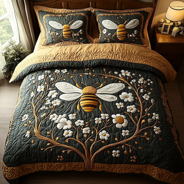 Sweet Flight quilted 3-piece bedding set on a made bed with two matching pillow shams