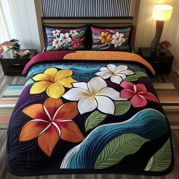 Sweet Fragrance quilted 3-piece bedding set on a made bed with two matching pillow shams