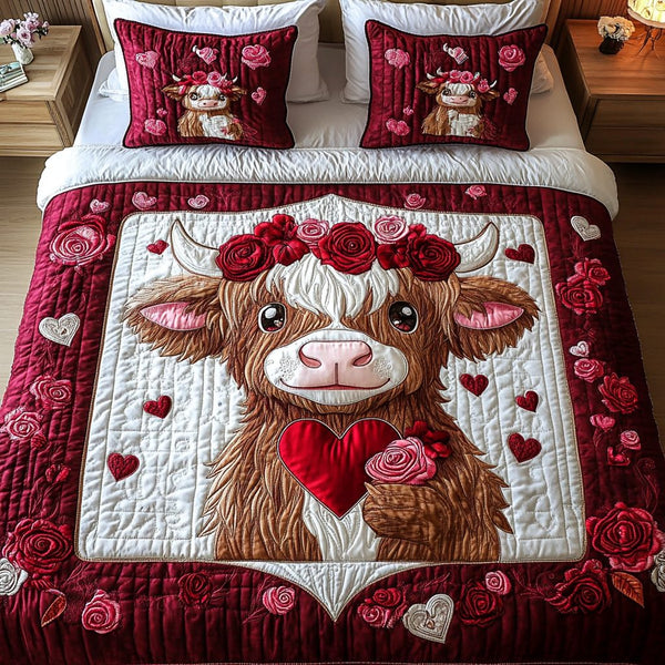 Sweet Pasture quilted 3-piece bedding set on a made bed with two matching pillow shams