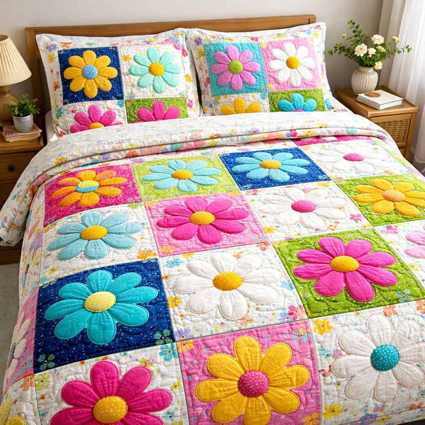 Sweet Patch quilted 3-piece bedding set on a made bed with two matching pillow shams