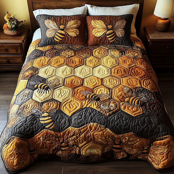 Sweet Serenity quilted 3-piece bedding set on a made bed with two matching pillow shams
