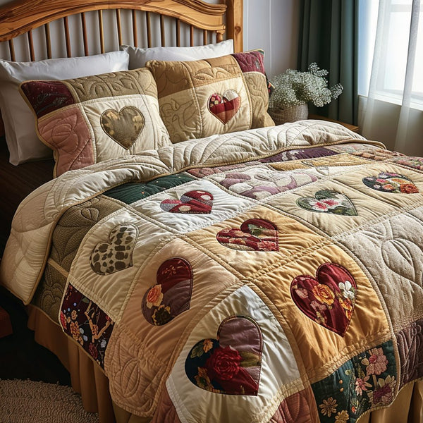 Sweetheart Stitch quilted 3-piece bedding set on a made bed with two matching pillow shams