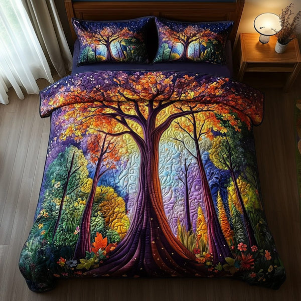 Sylvan Dream quilted 3-piece bedding set on a made bed with two matching pillow shams