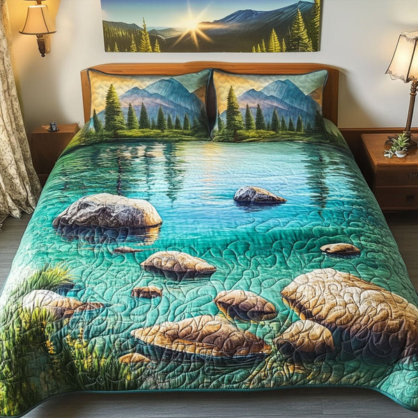 Tahoe Calm quilted 3-piece bedding set on a made bed with two matching pillow shams