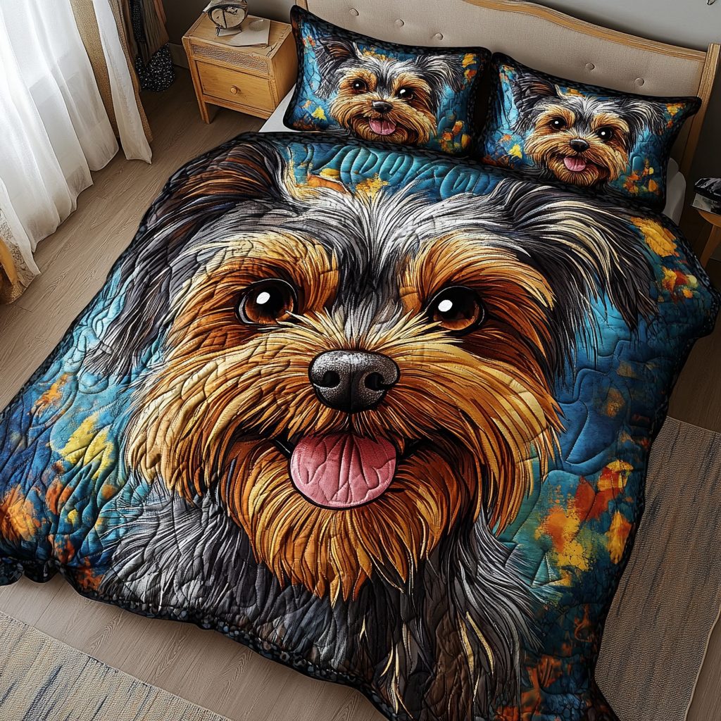 Tail Comfort quilted 3-piece bedding set on a made bed with two matching pillow shams