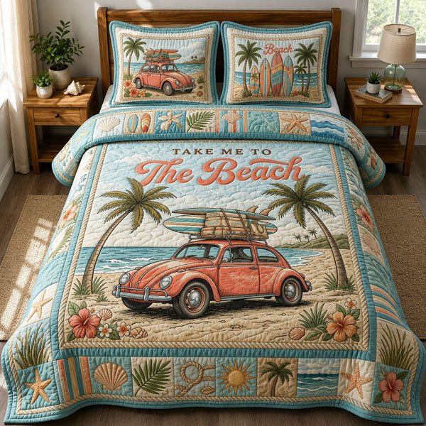 Take me to The Beach quilted 3-piece bedding set on a made bed in a light coastal bedroom