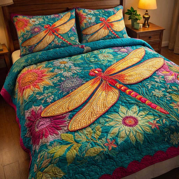 Teal Blossom quilted 3-piece bedding set on a made bed with two matching pillow shams