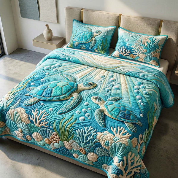 Teal Current quilted 3-piece bedding set on a made bed with two matching pillow shams