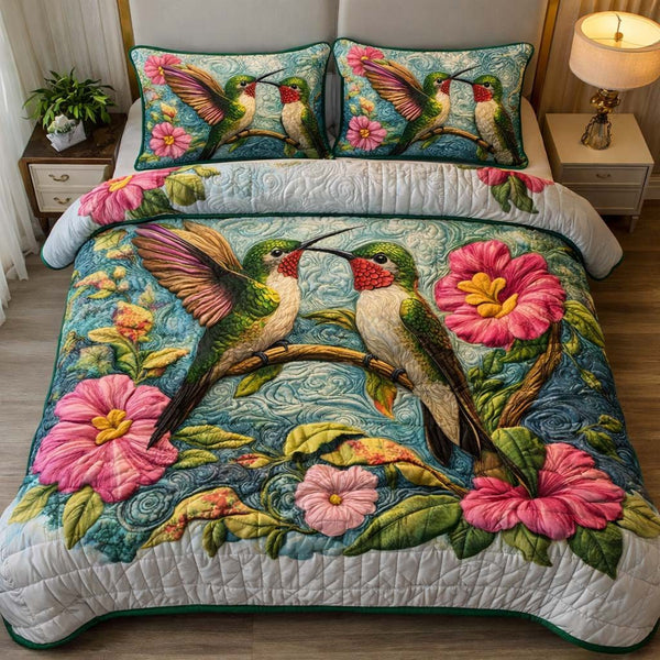 Teal Romance quilted 3-piece bedding set on a made bed with two matching pillow shams
