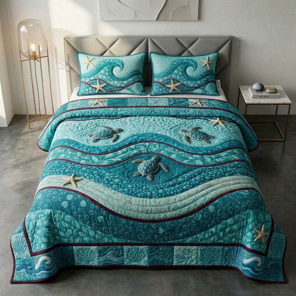 Teal Turtle quilted 3-piece bedding set on a made bed in a light coastal bedroom
