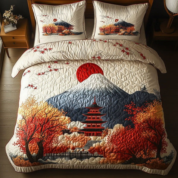 Temple in Autumn quilted 3-piece bedding set on a made bed with two matching pillow shams