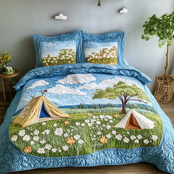 Tent Escape quilted 3-piece bedding set on a made bed with two matching pillow shams