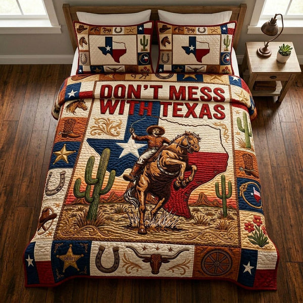 Texas Prairie Meadow quilted 3-piece bedding set on a made bed in a rustic timber bedroom