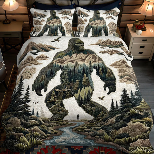 The Bigfoot Mystery quilted 3-piece bedding set on a made bed with two matching pillow shams
