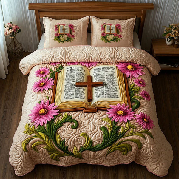 The Blooming Cross quilted 3-piece bedding set on a made bed in a softly lit bedroom