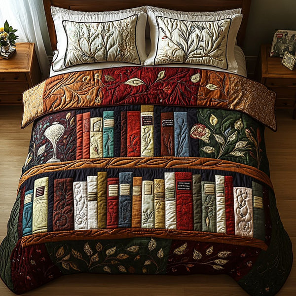 The Book Haven quilted 3-piece bedding set on a made bed with two matching pillow shams